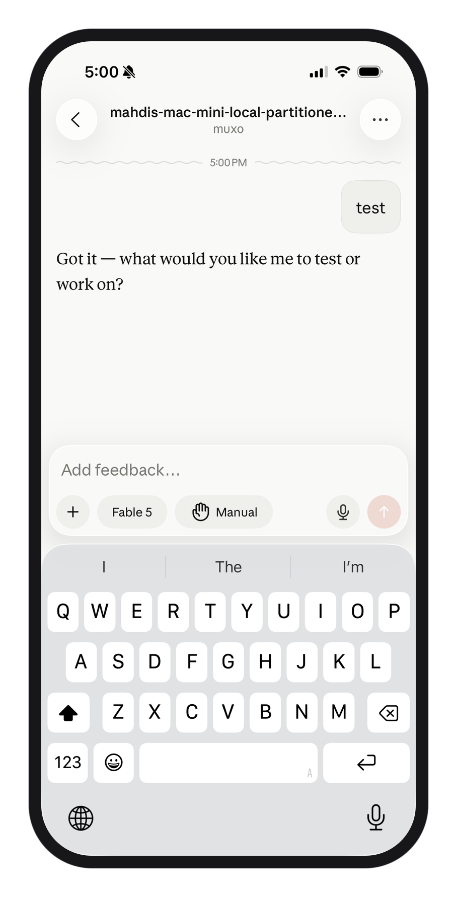 A phone in a minimal dark frame showing the Claude iOS app. The open conversation is the muxo session from the Mac mini, picked up over remote control, with a reply from the agent on screen and the message box reading Add feedback.
